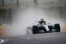 Japanese GP practice: Lewis Hamilton fastest but session a washout
