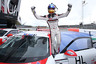 Porsche Junior Sven Müller celebrates rain victory at Silverstone